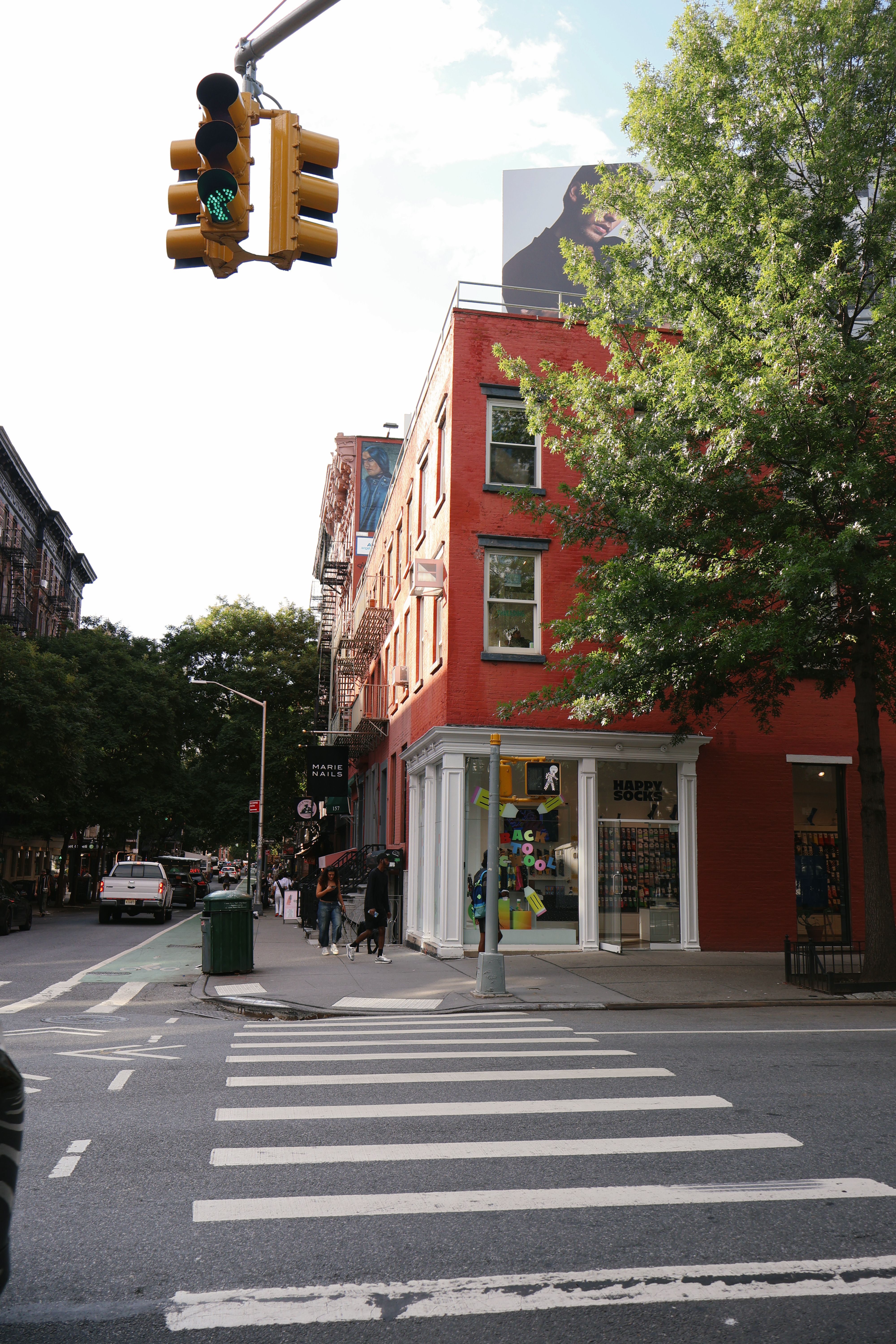 Row of historic brownstone townhouses with stoops
